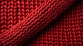 A close up of a red knitted fabric
