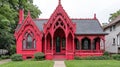 Vibrant red gothic cottage with intricate details Royalty Free Stock Photo