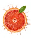 Half grapefruit slice with water splashes and green leaf on white background citrus Royalty Free Stock Photo