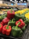 Vibrant Red and Green Peppers on Display Royalty Free Stock Photo