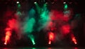 Vibrant Red Green Smoke Machines Creating Dramatic Fog Effects Under Stage Lighting System Royalty Free Stock Photo