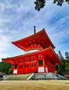 The vibrant red Konpon Daito Pagoda in the Unesco listed Danjo Garan shingon buddhism temple complex in Koyasan, Wakayama, Japan Royalty Free Stock Photo