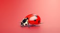 A vibrant red ladybug on a soft pink background
