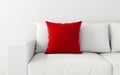 Vibrant Red Pillow on White Sofa with White Background -Generative ai Royalty Free Stock Photo