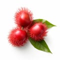 Vibrant Red Rambutan On White Background With Greenery