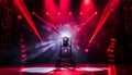 Vibrant red stage spotlight illuminating the captivating performance on a theatrical stage