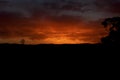 Vibrant red sunset caused by bushfire smoke