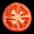 Vibrant Red Tomato Slice Exhibiting Fresh Texture and Seeds for Culinary Use Royalty Free Stock Photo