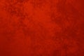 A vibrant red velours background, fabric surface. Royalty Free Stock Photo