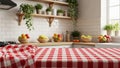 Empty Red Gingham Tablecloth in Modern Kitchen with Fresh Fruit Background Royalty Free Stock Photo