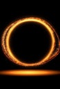 Vibrant Ring of Fire with a Shimmering Glow on a Dark Black Background, Abstract Artistic Design Royalty Free Stock Photo