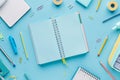 Vibrant school supplies arranged on light blue background, cheerful theme AI Image Royalty Free Stock Photo