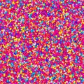 Vibrant seamless texture of brightly colored tiny confetti pieces creating a dense background pattern perfect for celebrations and Royalty Free Stock Photo