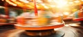 Vibrant seaside carnival with blurred rides and energetic crowds for event advertising