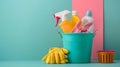 Colorful cleaning supplies in blue bucket. household chore concept. bright pastel backdrop. minimalist style. clean Royalty Free Stock Photo