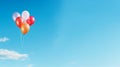 Vibrant Solitary Balloon Floating High in a Clear Blue Sky