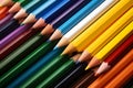 Vibrant spectrum diverse and colorful pencils on paper inspire artistic imagination and expression Royalty Free Stock Photo