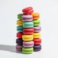 A vibrant stack of colorful macarons arranged in a neat vertical tower Royalty Free Stock Photo