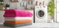 The vibrant stack of fresh towels in a bright laundry room. AI generated image Royalty Free Stock Photo