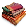 Vibrant Stack of Indian Silk Sarees Traditional Textiles Rich Colors Royalty Free Stock Photo