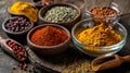 Aromatic Spices: Vibrant Selection in Bowls on Rustic Wooden Surface Royalty Free Stock Photo