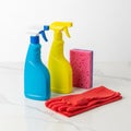 Colorful Cleaning Supplies Set: Spray Bottles, Sponge, and Gloves Royalty Free Stock Photo