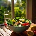 Colorful Salad Bowl with Grilled Chicken and Lemon Wedges