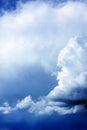 Vibrant storm clouds over the dark blue sky Royalty Free Stock Photo