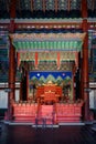 Is a vibrant and striking image of an ornately decorated throne in Gyeongbokgung Palace