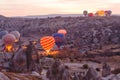 Vibrant sunrise landscape, Cappadocia ballooning early morning. Royalty Free Stock Photo