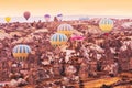 Vibrant sunrise landscape, Cappadocia ballooning early morning. Royalty Free Stock Photo