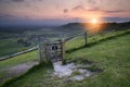 Vibrant sunrise over countryside landscape