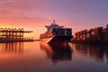 Vibrant sunrise scene, Container ship loads freight at import-export port