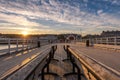 Vibrant sunset casting golden light over Beaumaris Pier in North Wales Royalty Free Stock Photo