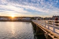 Vibrant sunset casting golden light over Beaumaris Pier in North Wales Royalty Free Stock Photo