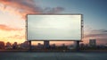 Vibrant sunset forming a fiery backdrop for a blank billboard frame, perfect for bold advertising