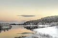 Vibrant sunset in a lake nearby Inari, Finland Royalty Free Stock Photo