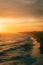 Vibrant sunset over the beach from the Balboa Pier, in Newport Beach, Orange County, California Royalty Free Stock Photo