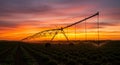 Vibrant Sunset Over Irrigated Farm Field Royalty Free Stock Photo