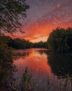 A vibrant sunset over Prospect Park Lake, in Brooklyn, New York City