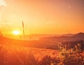 Vibrant Sunset Over Rolling Hills With Golden Light And Dramatic Sky In Summer Royalty Free Stock Photo