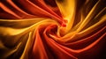A vibrant swirl of orange and yellow silk fabric, creating a dynamic and elegant texture. Royalty Free Stock Photo