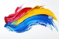 A vibrant swirl of red, yellow, and blue paint on a white background, showcasing artistic expression Royalty Free Stock Photo
