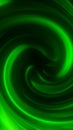 Vibrant swirling green energy vortex forming smooth glowing waves in an abstract dynamic pattern Royalty Free Stock Photo