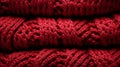 A close up of a red knitted fabric background