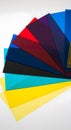 Vibrant transparent color sheets fanned out on a clean white background Royalty Free Stock Photo