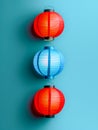 Vibrant Trio of Japanese Lanterns on a Blue Background Traditional Asian Lighting Decoration Concept