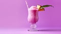 Vibrant tropical pink slushy on a purple background, a refreshing and colorful frozen beverage