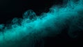 Vibrant turquoise aqua cloud of shimmering pigment dissolving slowly within dark liquid creating an abstract mesmerizing wave of Royalty Free Stock Photo