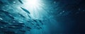 The vibrant underwater scene featuring a school of fish illuminated by sunlight. AI generated image Royalty Free Stock Photo